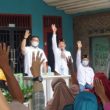 Diguyur Hujan,Silaturahmi Paslon Hebat Di Dusun Pulo Gombut Tetap Disambut Meriah Masyarakat